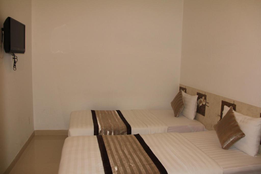 New Sunny Hotel โฮจิมินห์ซิตี้ ห้อง รูปภาพ
